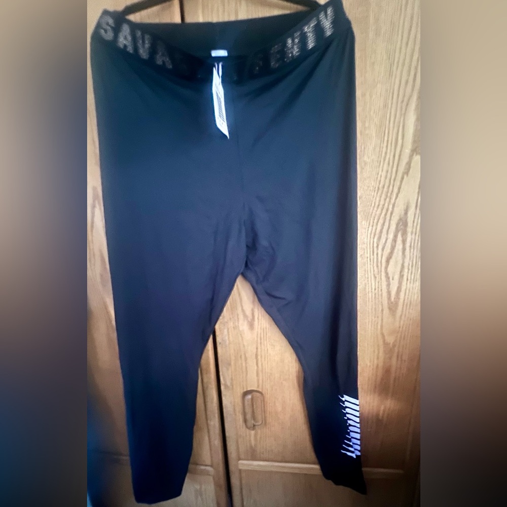Woman’s Black Athletic Leggings with White Stripe Accent